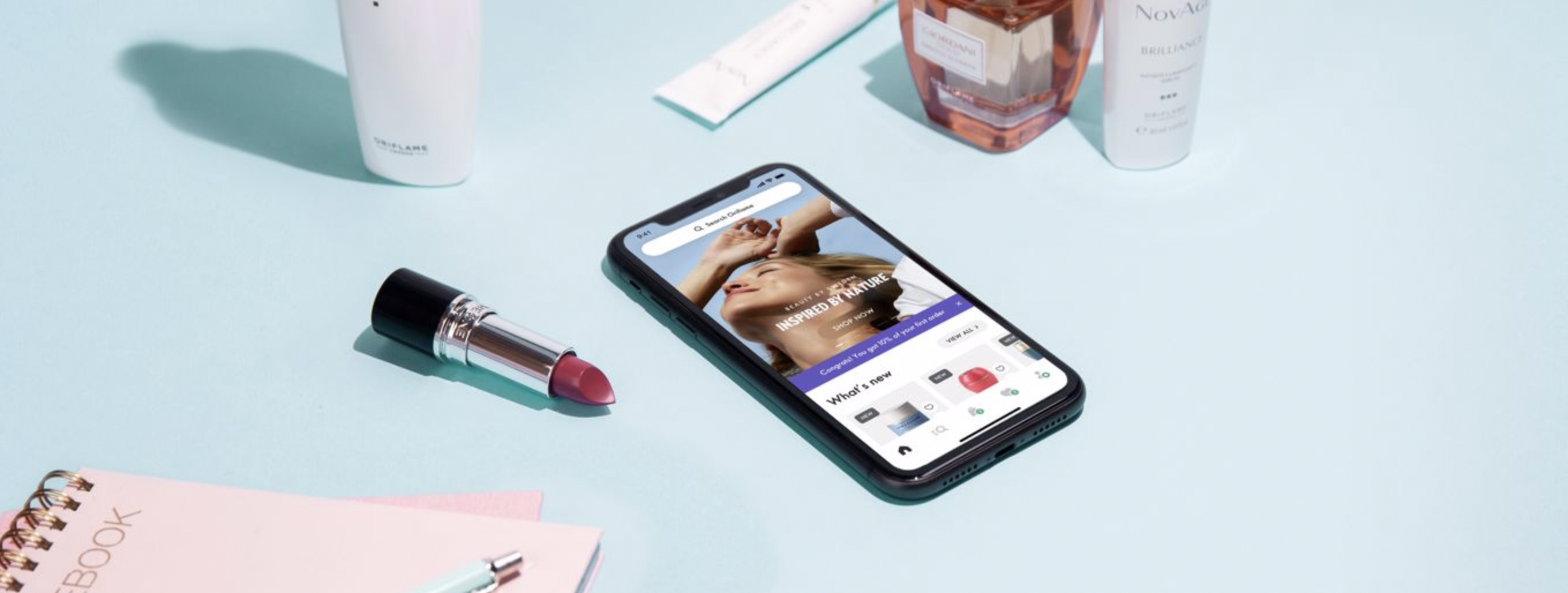 blurry photo of sunset over ocean with logo on top